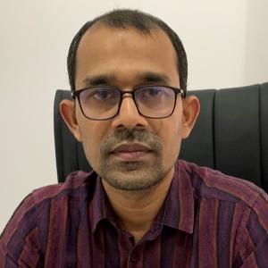 Portrait photo of M.C. Rasmin, lecturer at SWPS University's Asian Studies Summer School