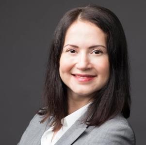 Portrait photo of Tamilla Triantoro, keynote speaker at HumanTech Meeting hosted by SWPS University