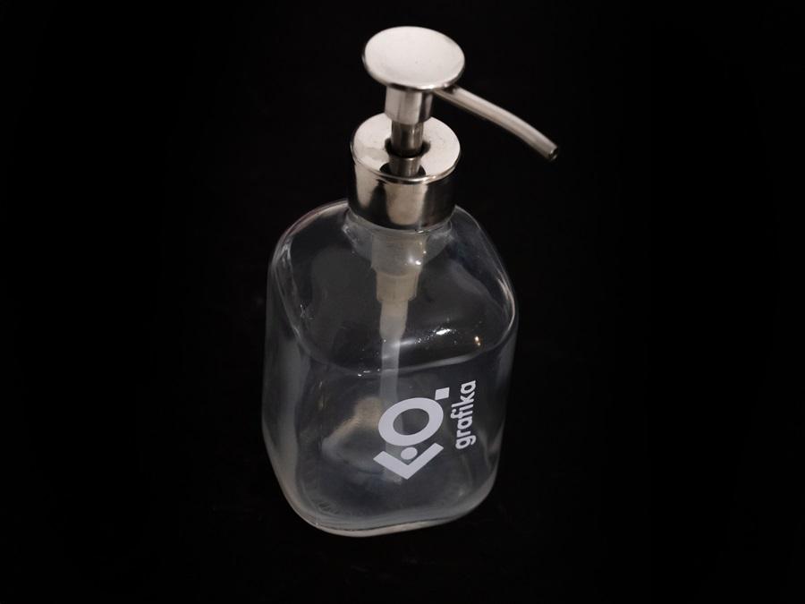 Final printing on a glass container for liquid soap