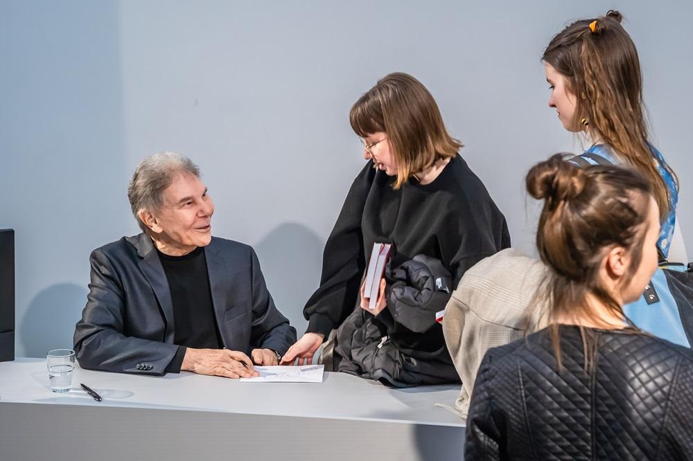 Professor Caldini signing his book for a student