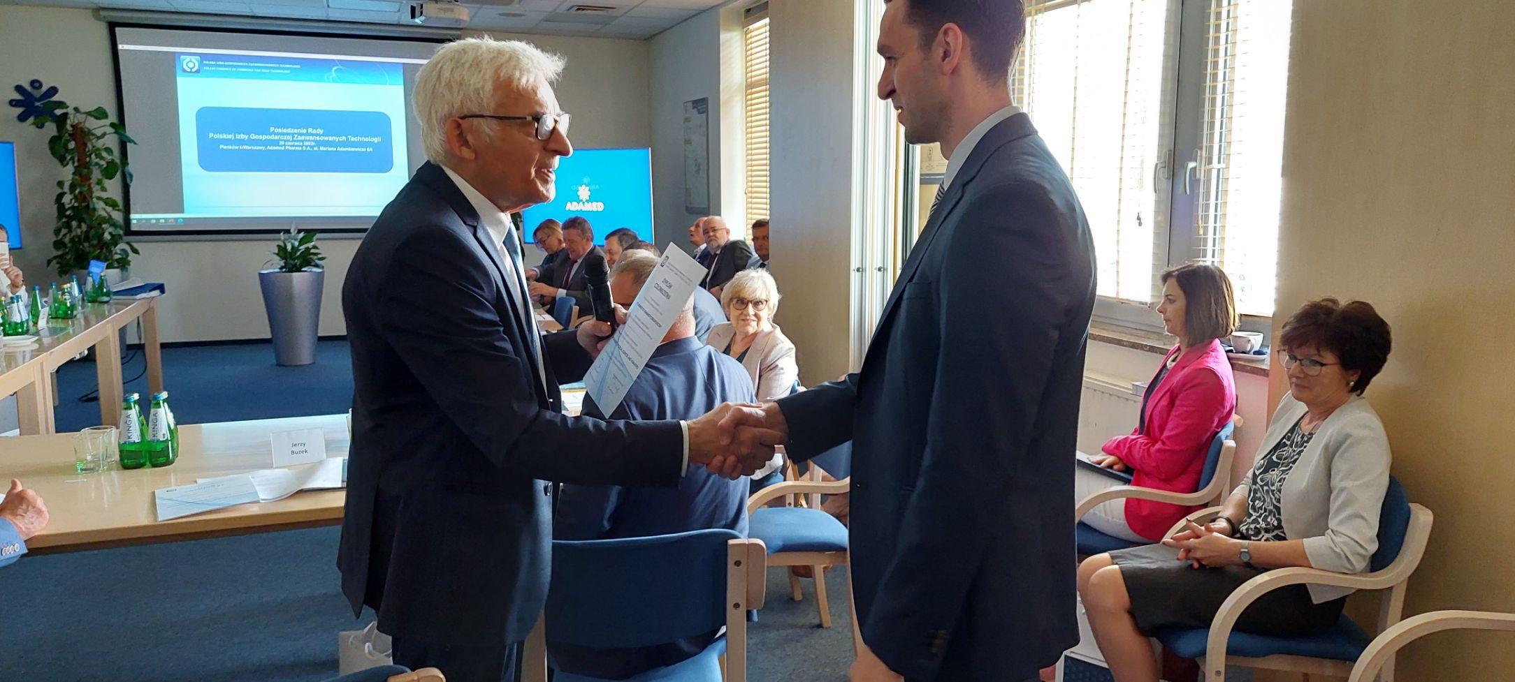 W. Karczewski i J. Buzek – IZTECH