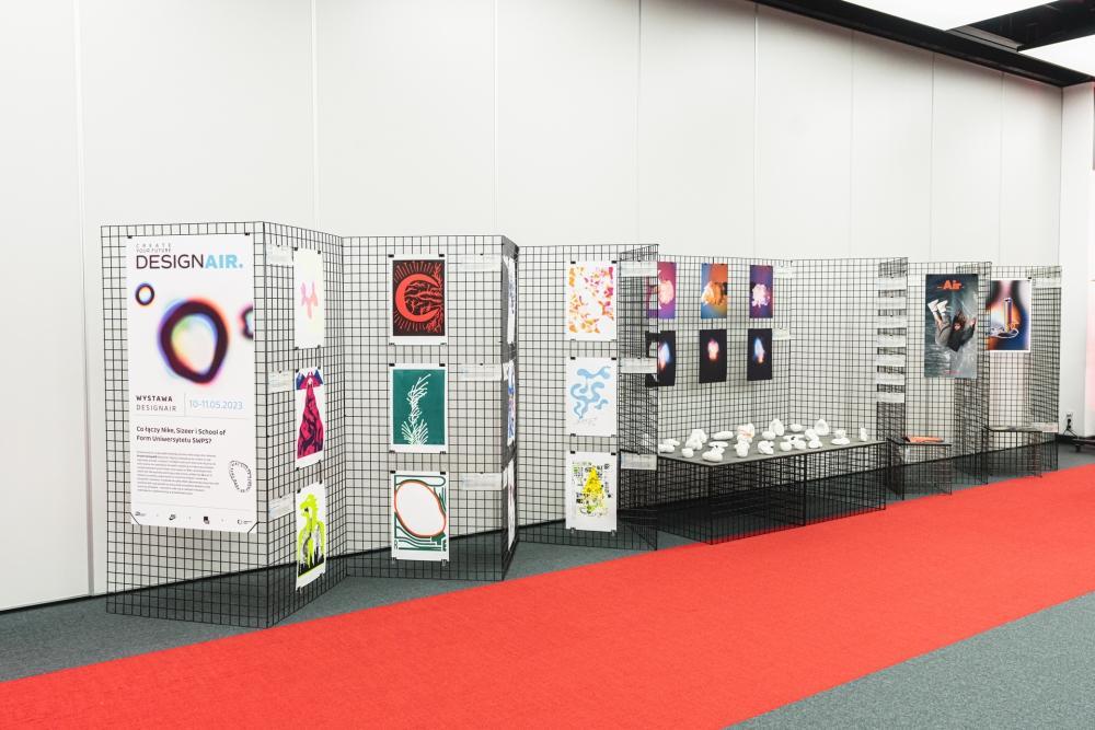 A distant view of the entire exhibition space, showcasing all the artworks