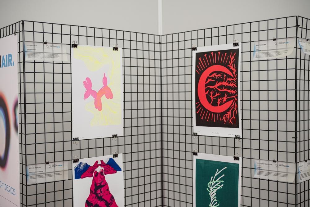 A photo of the exhibition highlighting a collection of vibrant artistic prints