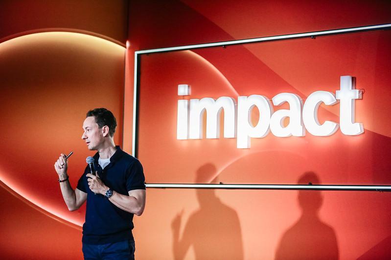 Wawrzyniec Smoczyński from SWPS University speaking at Impact'24 congress
