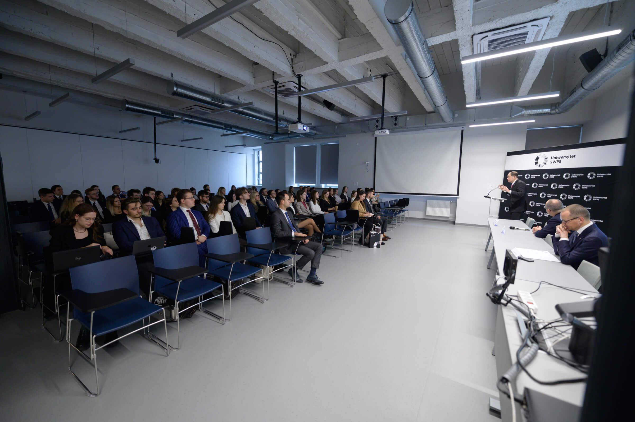 Audience at SWPS University in Warsaw, Poland, listens to speeches at the opening of the Vis Moot Bootcamp training.
