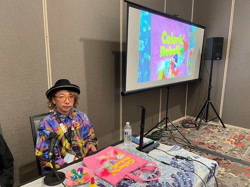 Sebastian Masuda showing his presentation on the screen