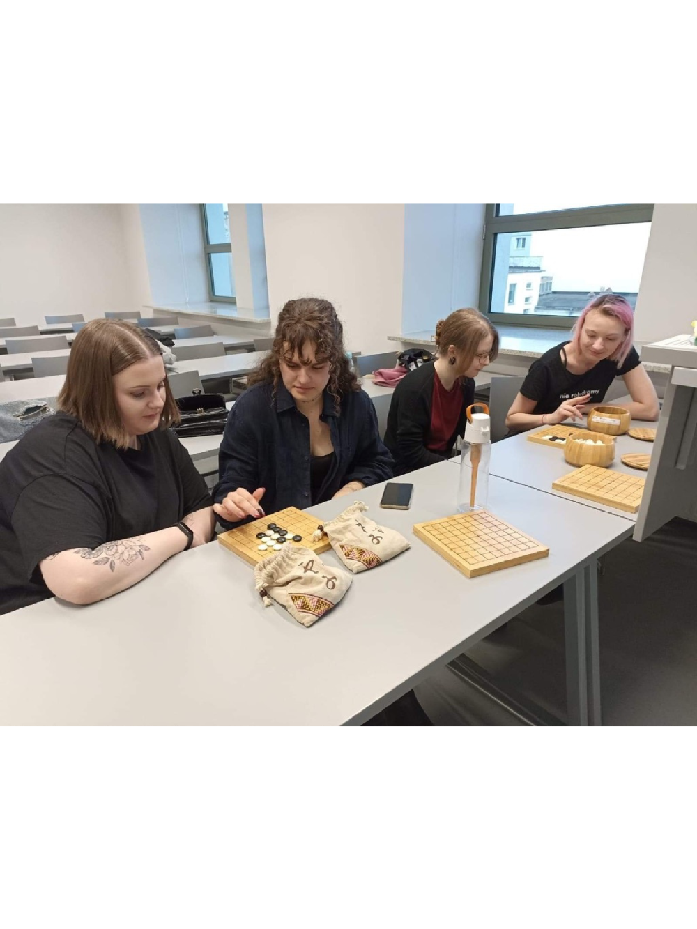 Students playing Chinese board games