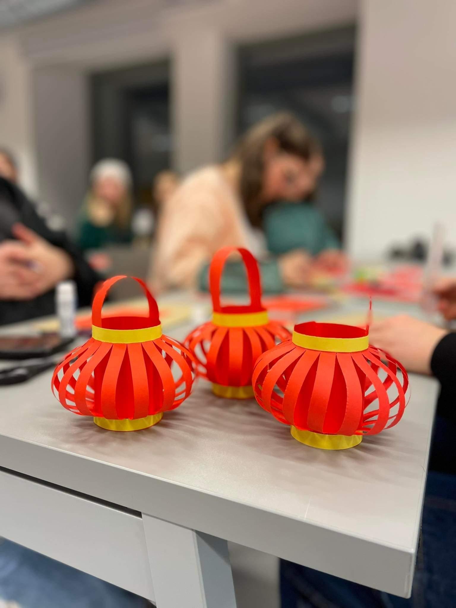 Students making traditional Chinese paper lanterns